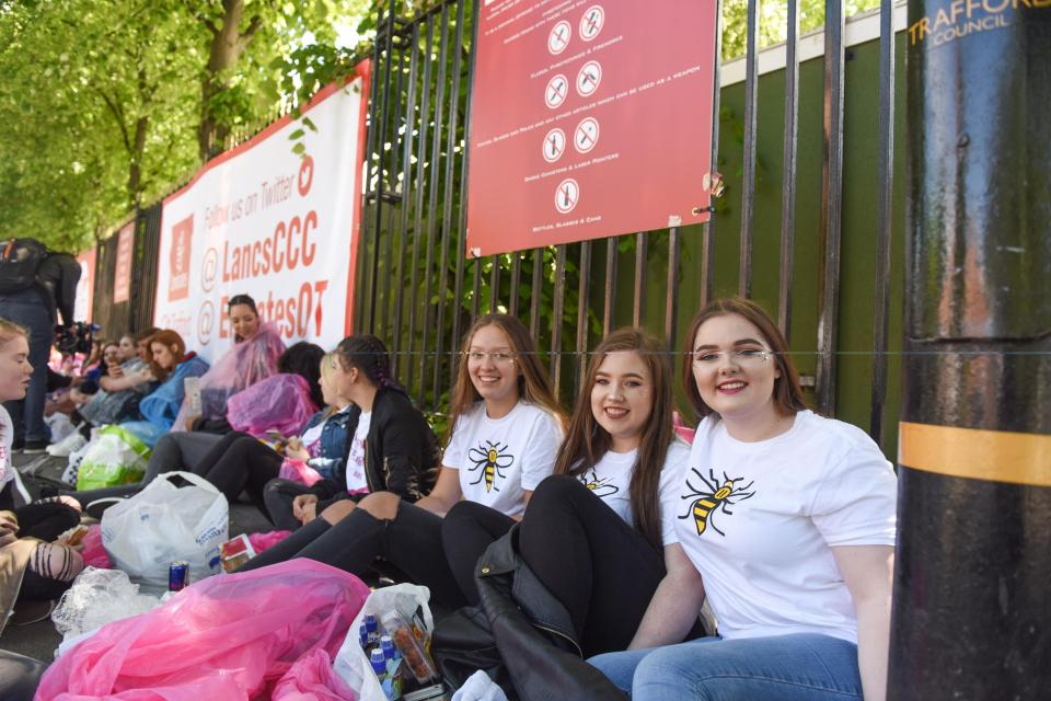  Defiant young fans gathered early to make it to the Manchester concert