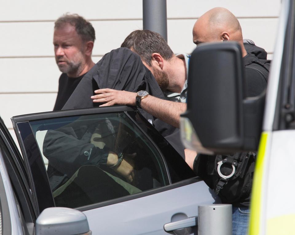  This woman was seen being led away in handcuffs in Barking