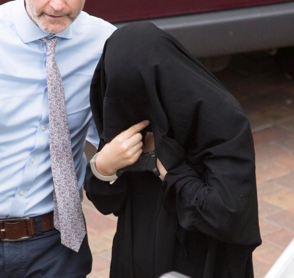  Arrest 3 . . . third female arrested has a scarf over her head