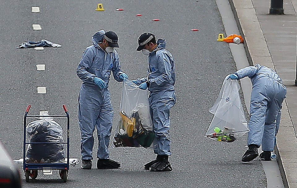 Forensic teams collect pieces of evidence to help with the investigation