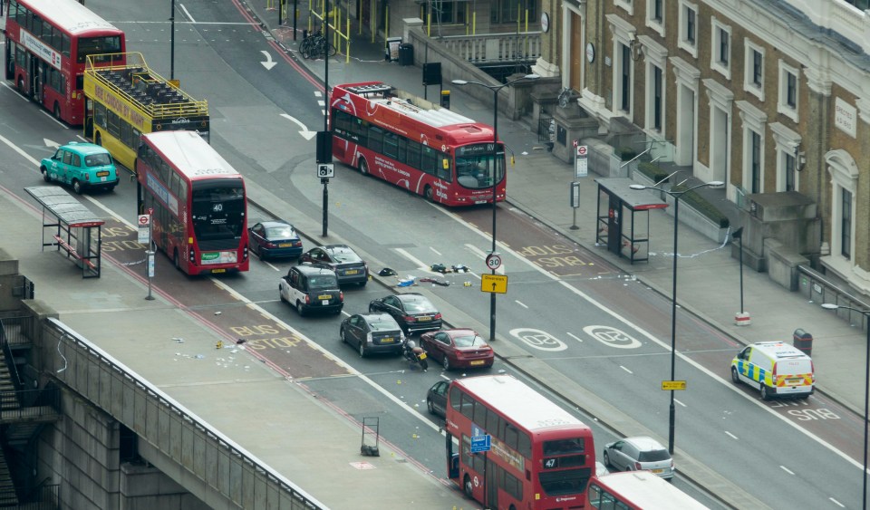 Scene on London Bridge following the attack where three jihadis wearing fake suicide bomb vests drove a van at 50mph into crowds on the brdige before going on a stabbing spree in nearby pubs