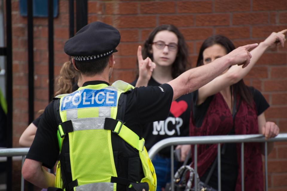  Cops at the Ariana Grande concert directed people as they arrived