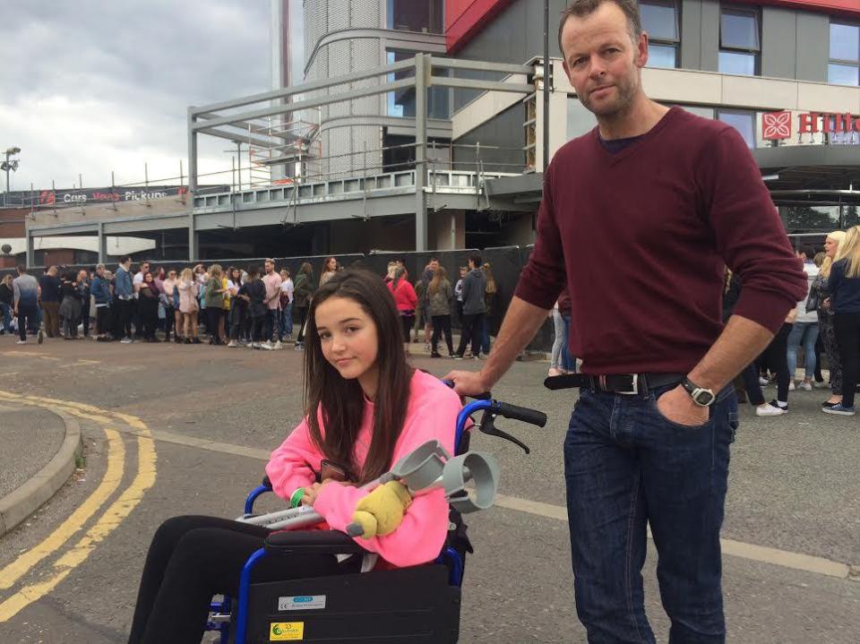  Millie Mitchell, 14, attended the concert with her dad Alasdair, 43, to show terrorists they 'won't win'