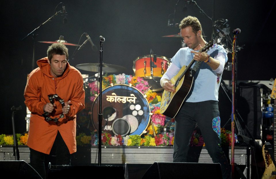  Oasis legend Liam Gallagher decided to put old foes behind him as he sang on stage with Coldplay's Chris Martin