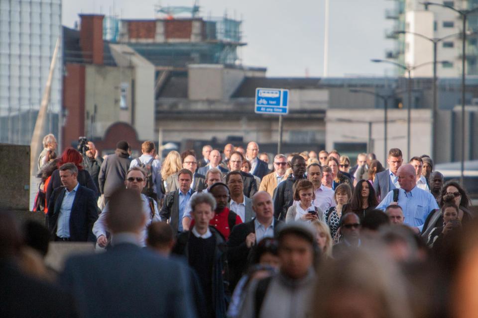  Hundreds of commuters were seen walking across the bridge after pedestrian traffic was reopened for those heading north