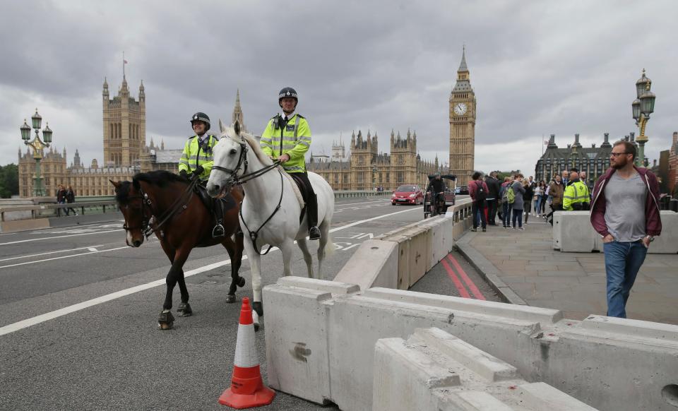  Mounted police were seen crossing Westminster Bridge today close to the new security barricades