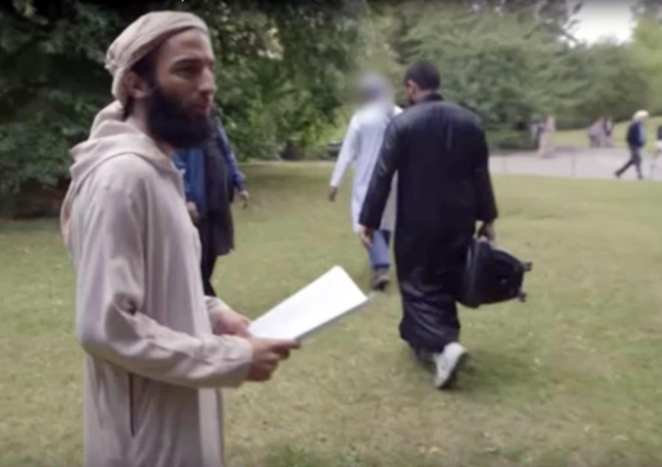 Abz pictured here turning to the camera after posing with the jihadi flag in the park