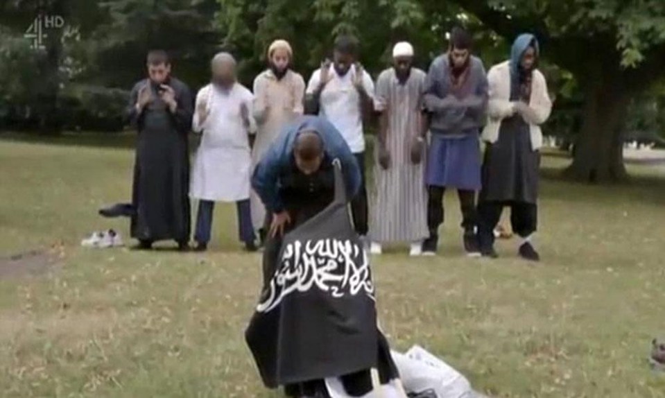 The terrorist was pictured as part of a group in Regent’s Park brandishing a black flag