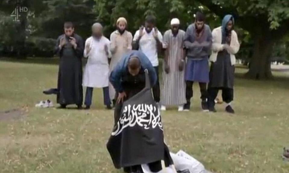  The terrorist was pictured as part of a group in Regent's Park brandishing a black flag