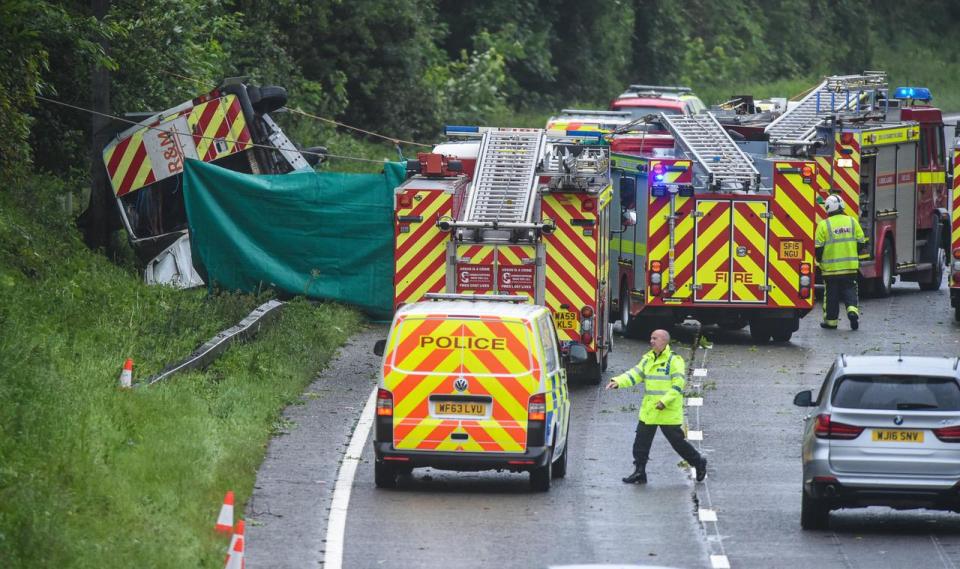 Horror crash ... three people died after a van was overturned on Devon Expressway