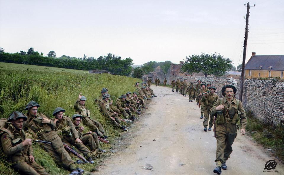  The British Army's Infantry of 50th Division moving forward near St Gabriel, Normandy, between Ver-sur-Mer and Crepon. Approximately 2,700 British troops lost their lives during the D-Day offensive