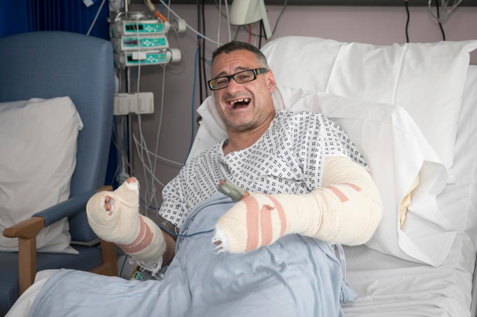 Roy, pictured recovering in hospital, said he still suffers from the painful trauma of the terror attack