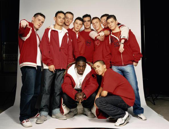  Marcel poses with his band Blazin' Squad, who topped the charts in the early Noughties