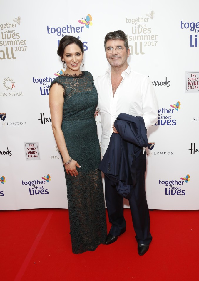 Simon Cowell and Lauren Silverman were all smiles as they attended the Together for Short Lives Midsummer Ball