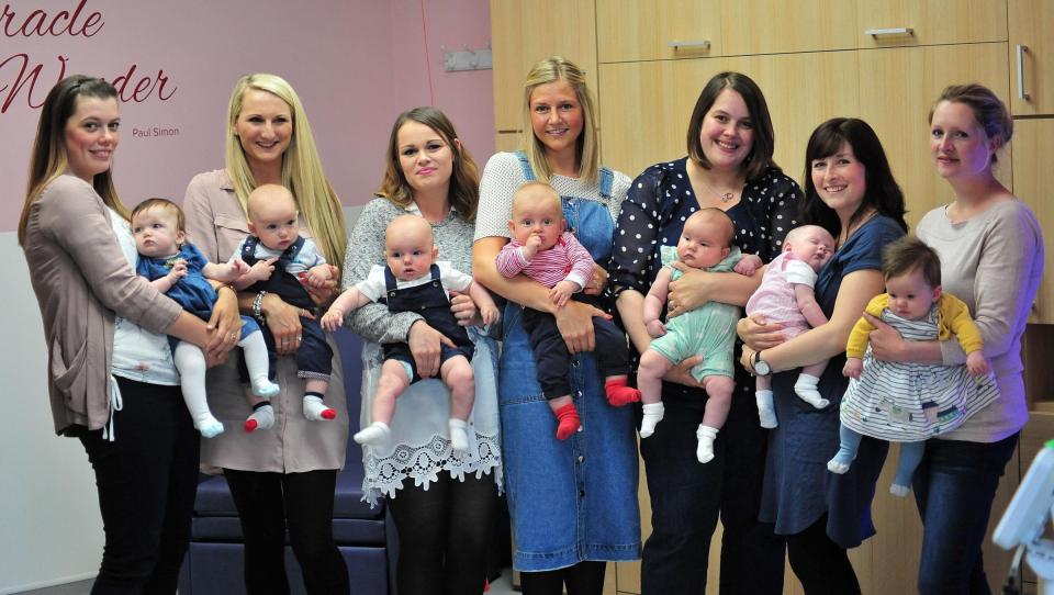  (Left to right) Kate Staiger with baby Evelyn, Zoe Hughes with baby Oliver, Natasha Holloway with baby Albie, Lucy Laird with baby Rupert, Bryony Bell with baby Jocelyn, Becca Allison with baby Rose and Rosie Smith with baby Darcey