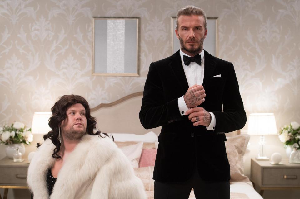  In another scene James looks adoringly at Becks who is posing in the iconic Bond pose