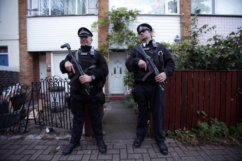  Armed police watch outside Mr Corbyn's house this morning