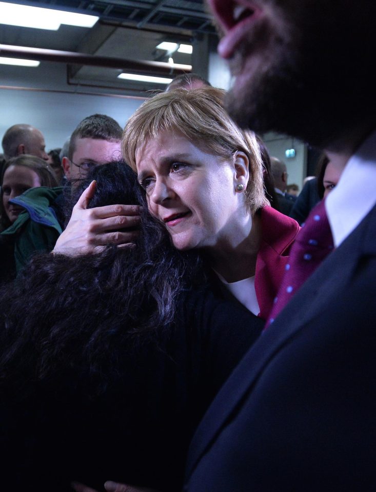  A tearful Nicola Sturgeon consoles an SNP supporter after a dreadful night for them