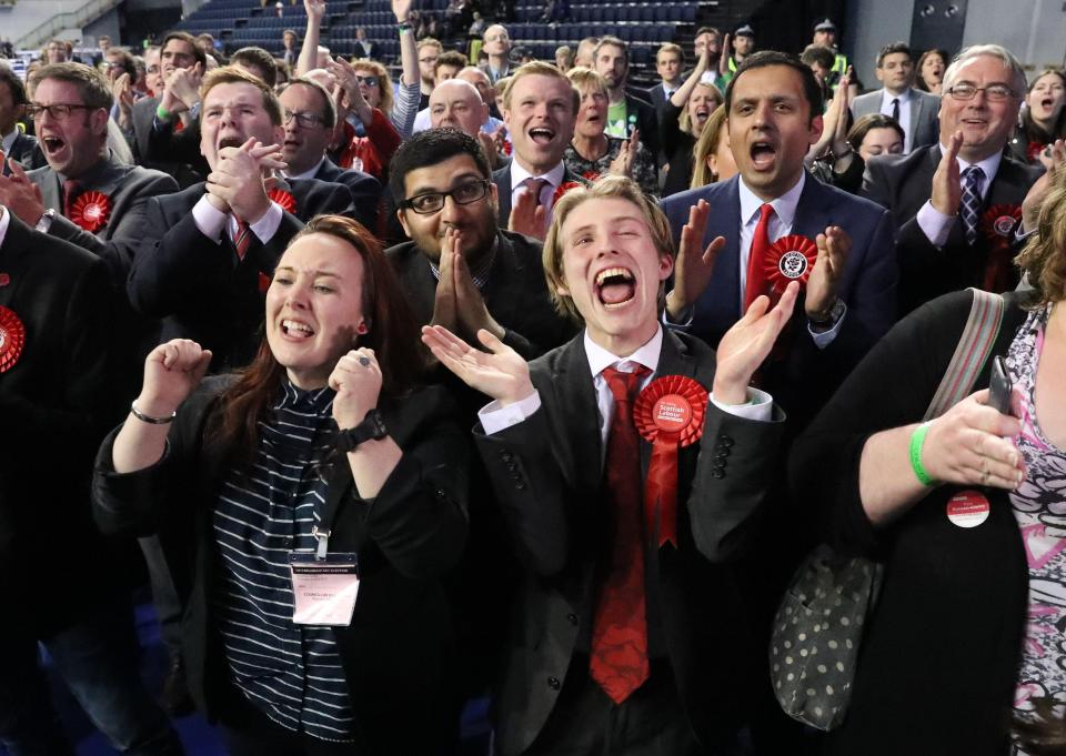  A jubilant set of supporters cheer a Labour win