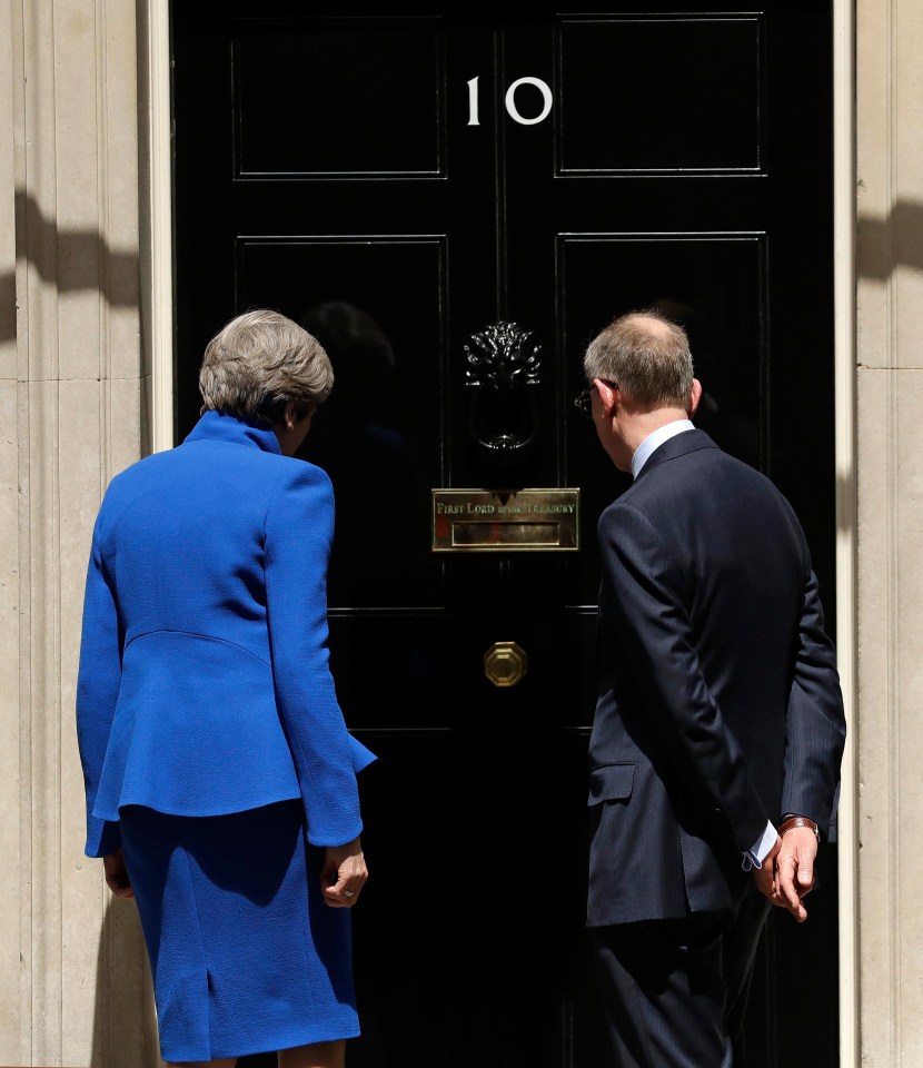 The PM entering No10 with her husband on Friday 