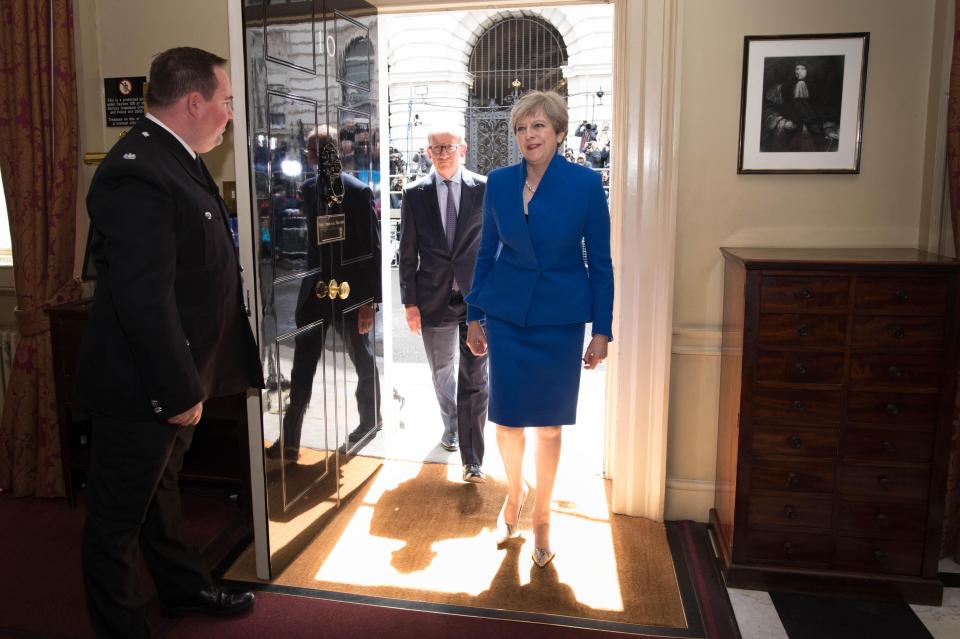  Mrs May was welcomed back into No10 today by staff