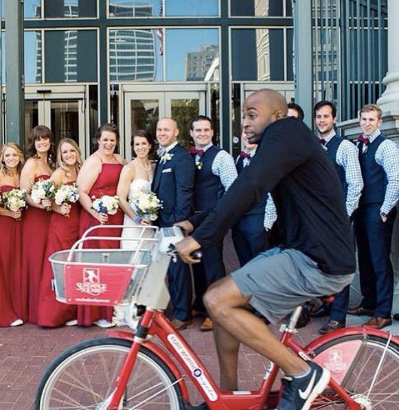  This bike rider tried to avoid ruining the wedding photos - but he was too late!