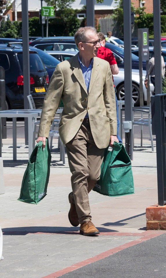 Trusty Phil carries the bags as pressure mounts on the PM