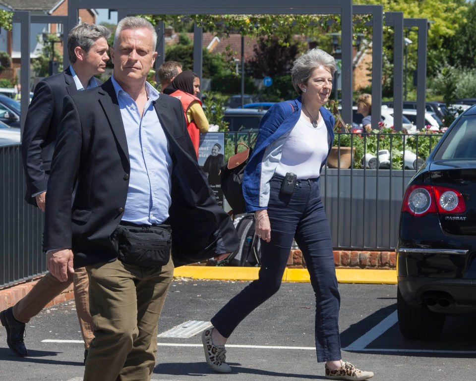 The PM was seen out shopping today with her husband Philip