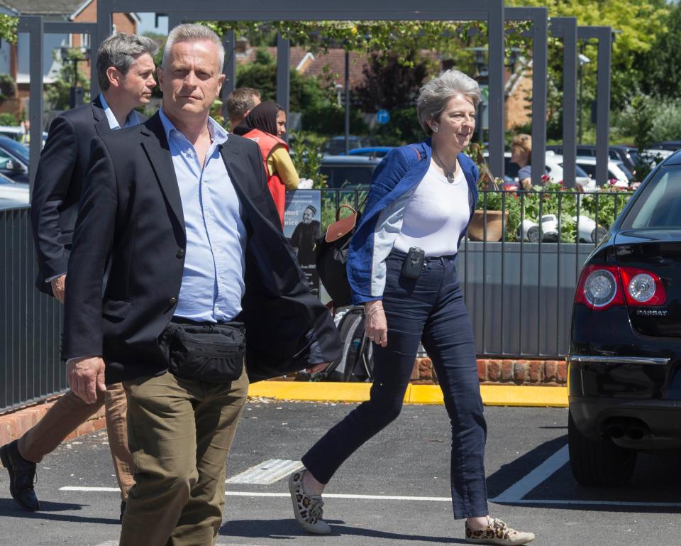  The PM was seen out shopping today with her husband Philip