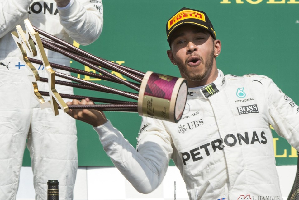 Hamilton celebrates winning the Canadian Grand Prix - but he is thinking about quitting the sport