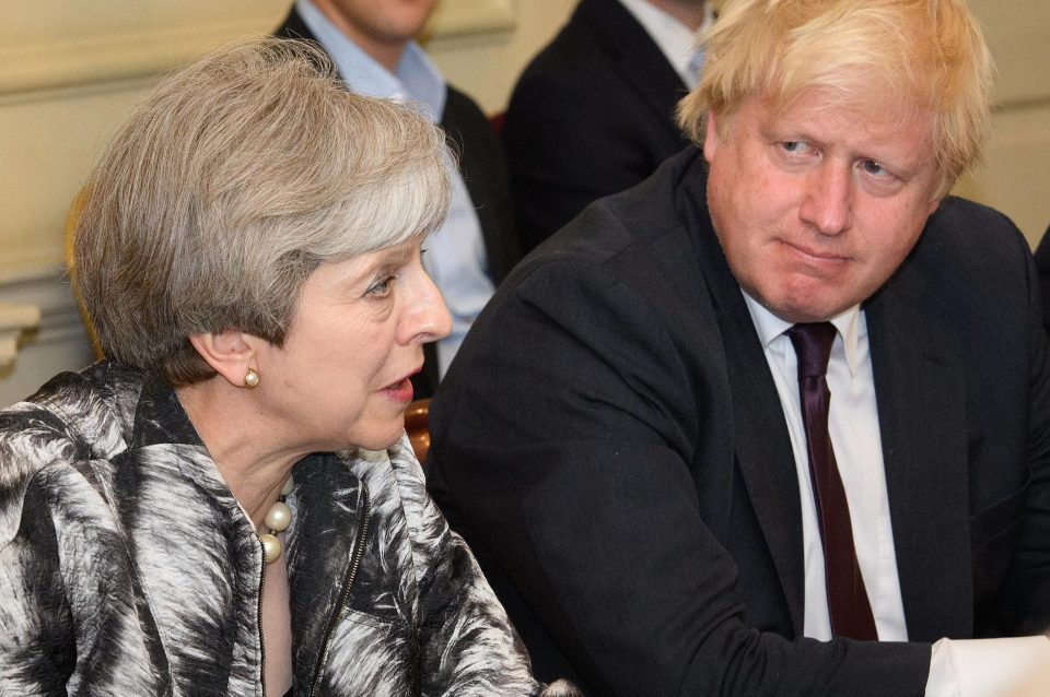  Theresa May was sitting next to Foreign Secretary Boris Johnson - who today encouraged colleagues to get around her