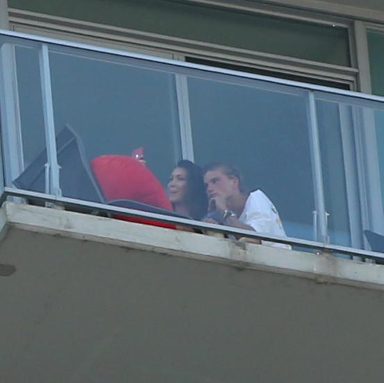 Bella and Jordan cosied up together on her balcony