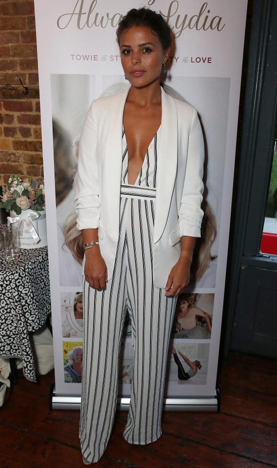  Chloe Lewis looked sharp in a pinstripe jumpsuit