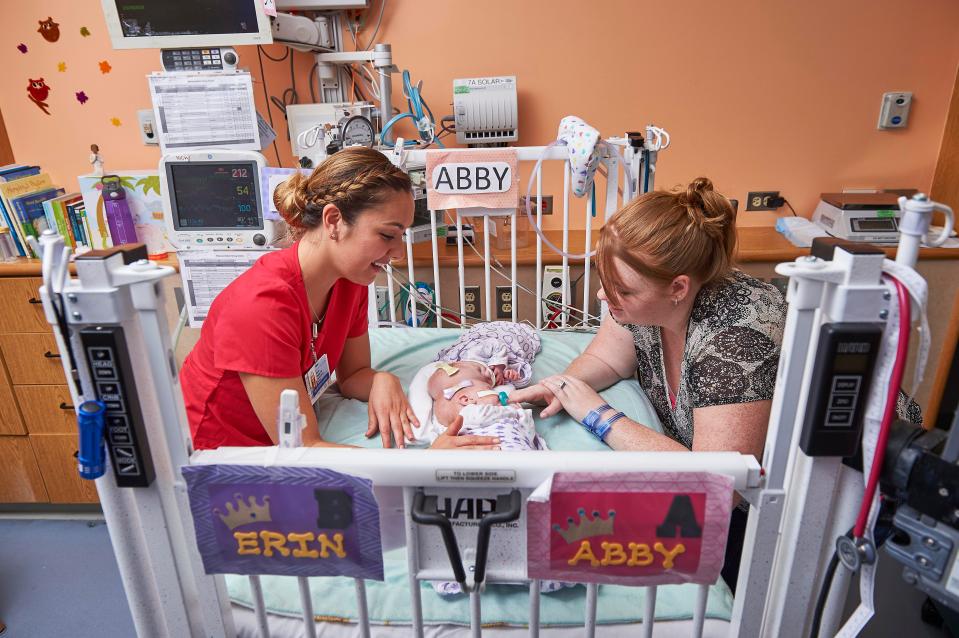 The twins are now lying in their own separate beds for the first time as they recover at the Children's Hospital of Philadelphia