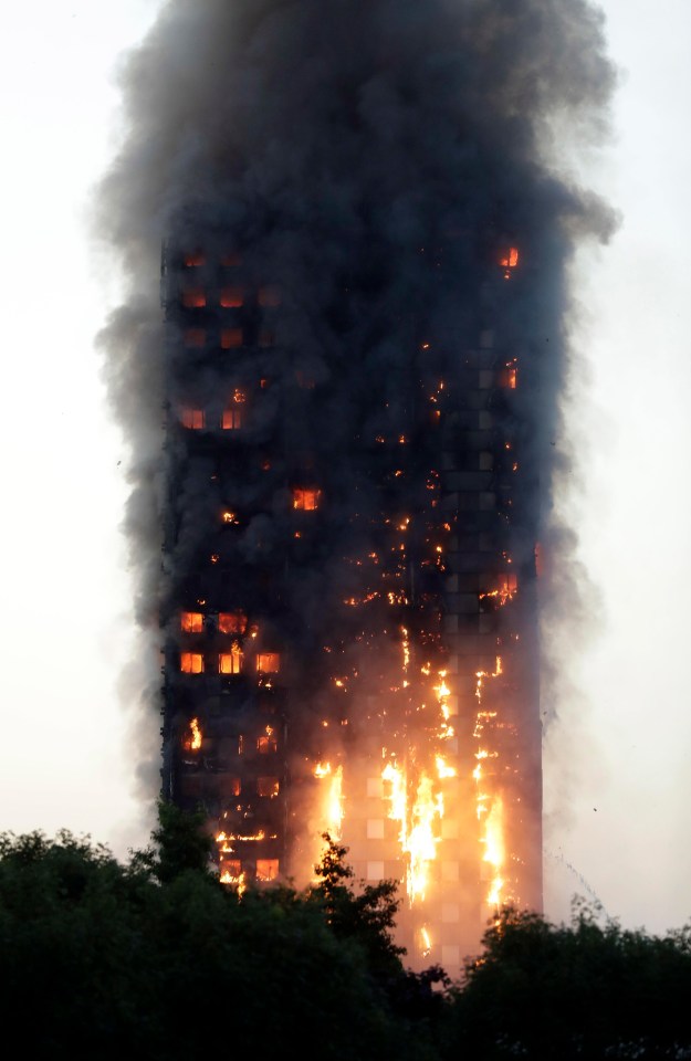 Thick black smoke was visible across London as the fire continued to burn after dawn