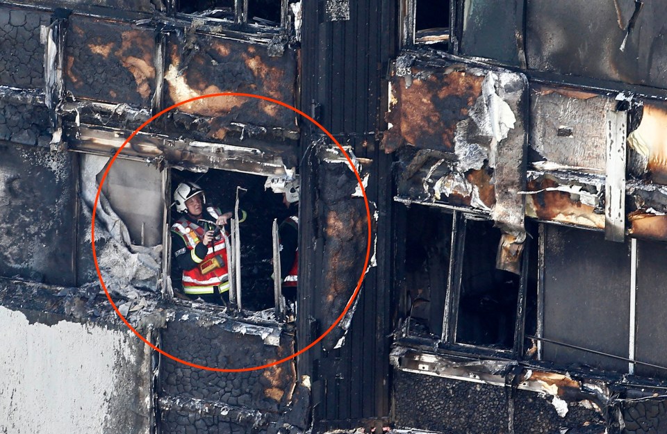 Firemen could be seen inside the building as they try to clear the floors