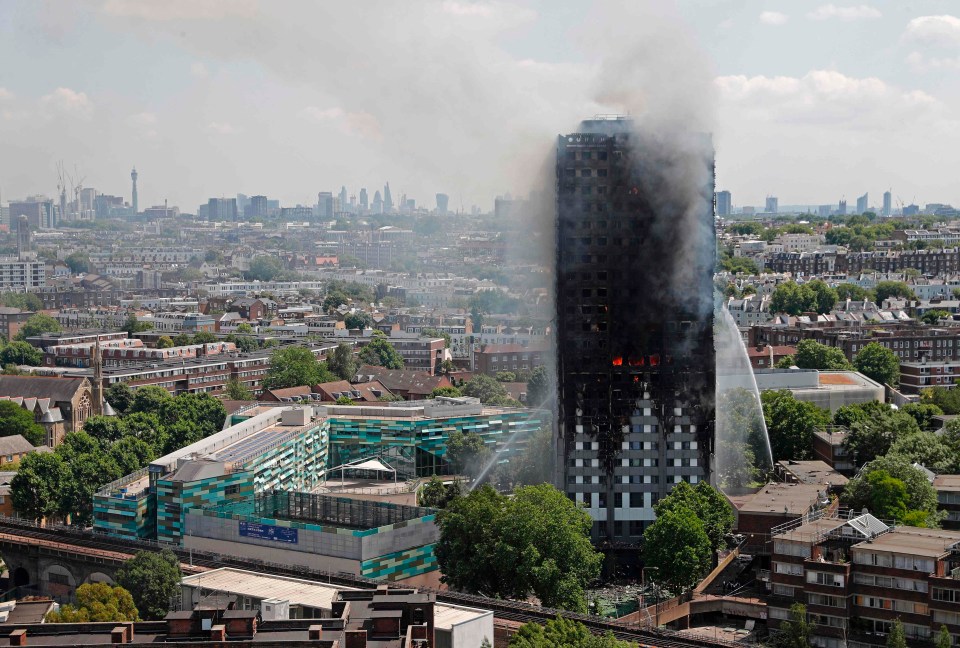 The building, which still had some floors ablaze, was scorched and charred 