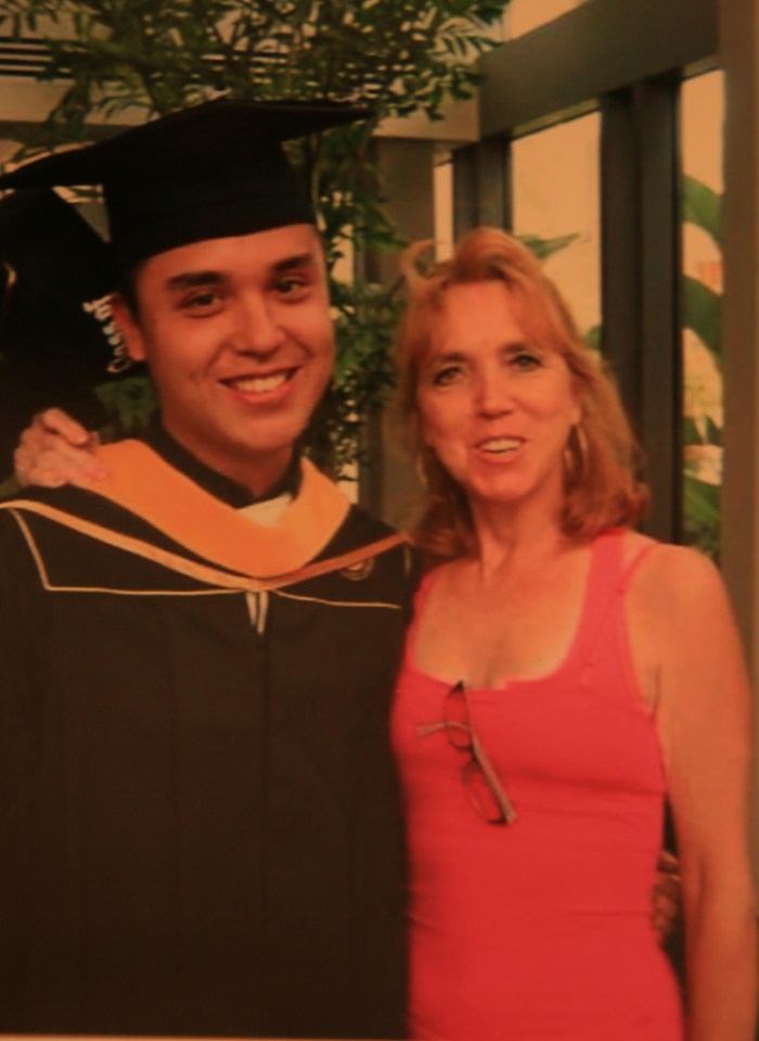 Christine, pictured with Christopher as he graduated from the University of Central Florida