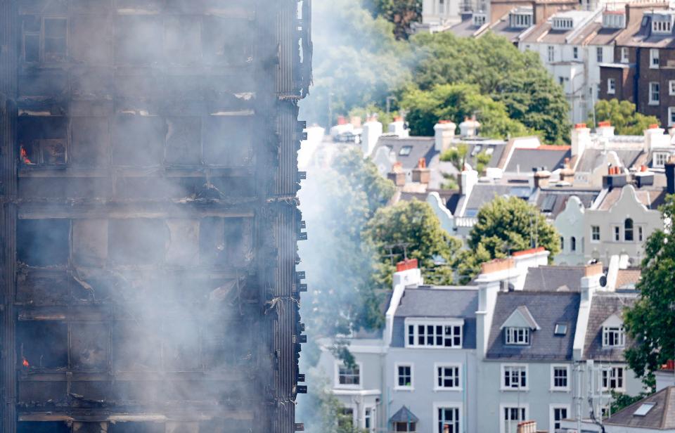  The charred remains of the 24-storey building