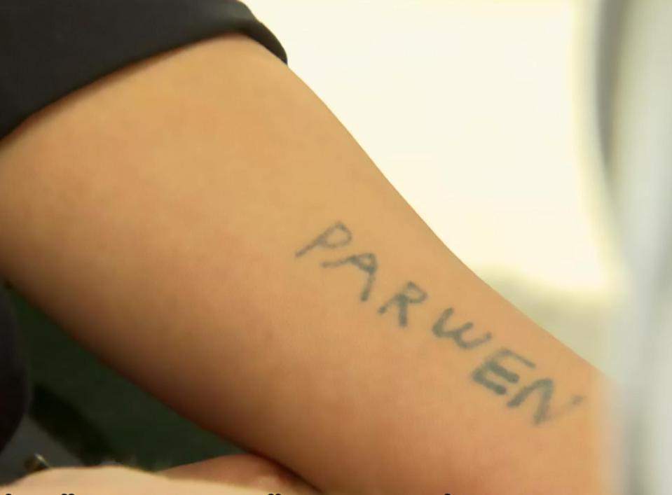  A former Yazidi sex slave tattooed her name on her arm so she could be identified in case she did not survive