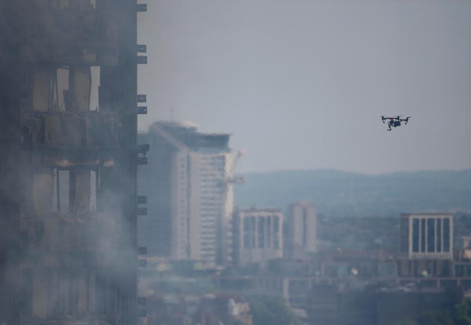  A fire crew drone surveys the damage to the building