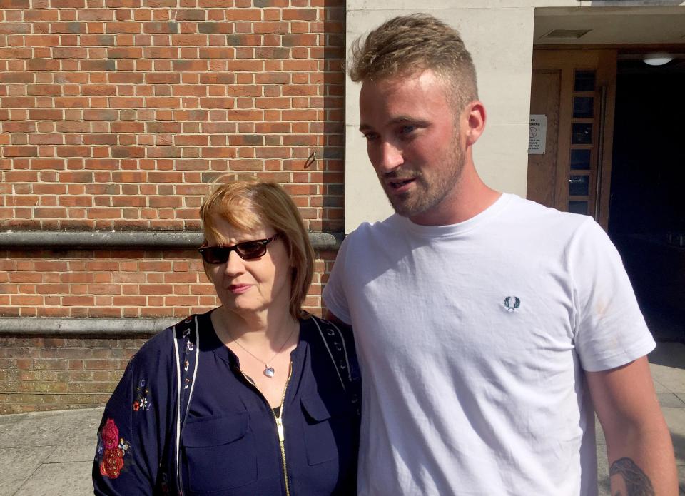  Sara Cotton, mother of Luke Miller, and his friend James Gissing, outside Isle of Wight Coroner's Court in Newport earlier this month