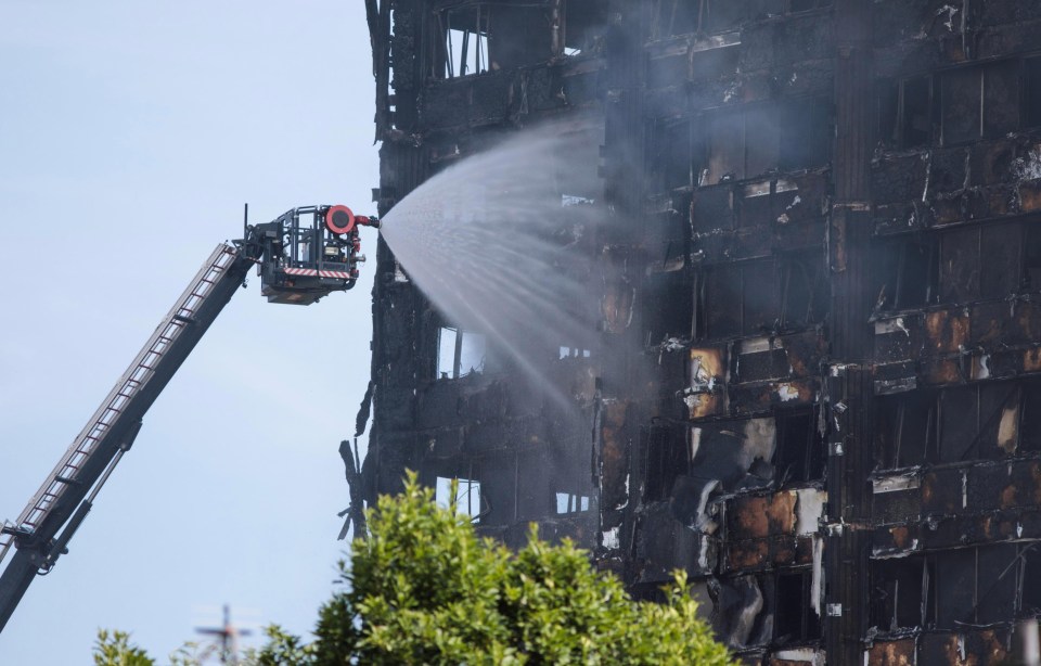 Firefighters are still extinguishing fire in parts of the building this evening