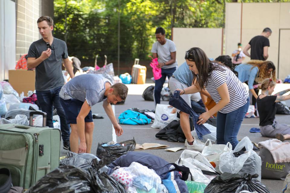  Hundreds of bags of clothing and food were donated to hand out to those who had lost everything