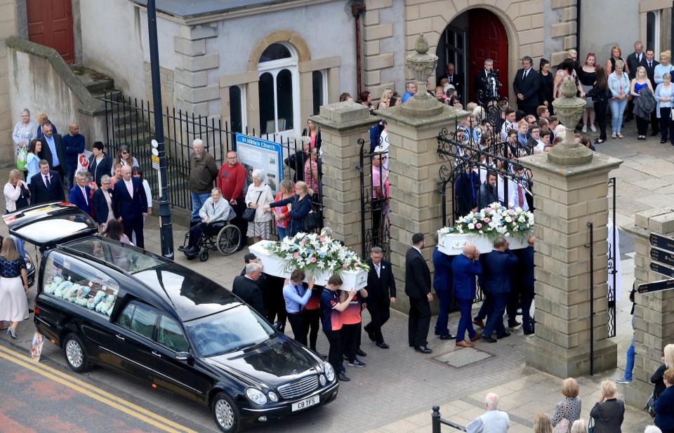  The tragic teen couples bodies are carried into the church for their joint funeral