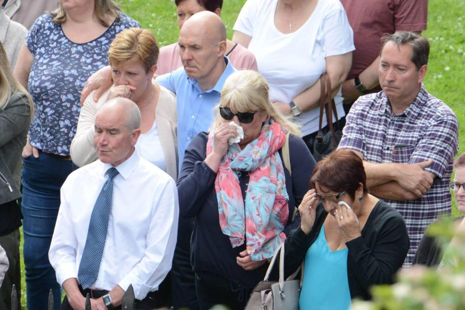  Mourners gather ahead of the funeral for the teen sweethearts