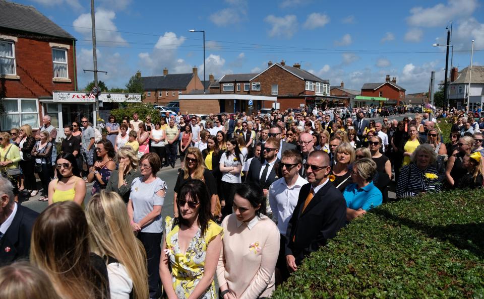  Mourners lined the streets for the procession today in Lancashire