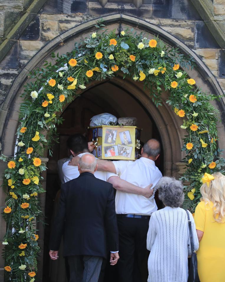  The coffin was carried into Holy Trinity Church in Tarleton, Lancs, today