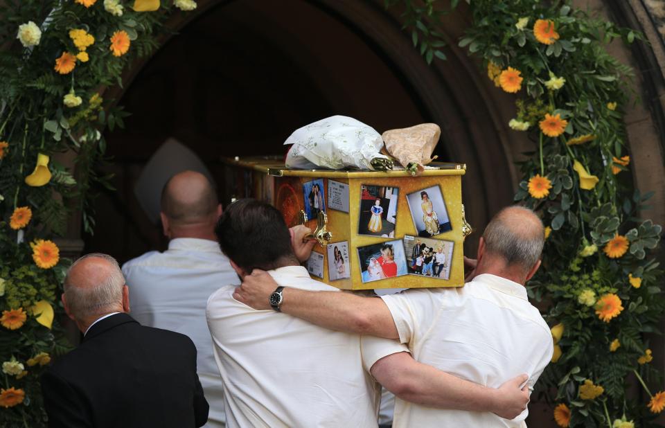  She was laid to rest today in a coffin covered in pictures of the tragic teen