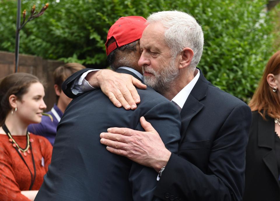  The Labour leader pictured hugging a local councillor during his visit